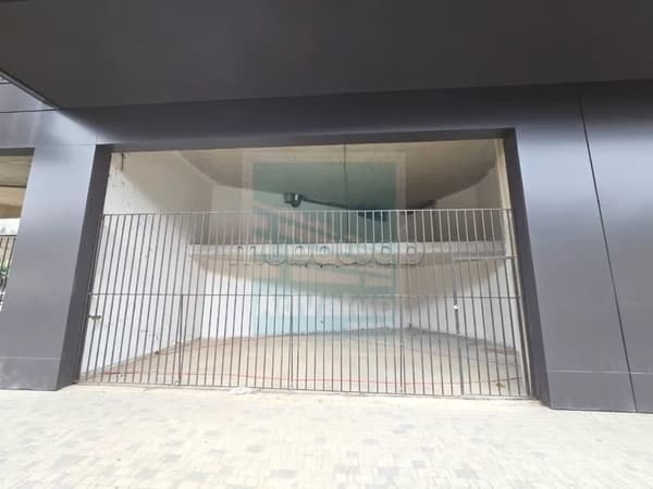 DL. 1021: Magasin à l'angle Bd Ghandi et Stendhal