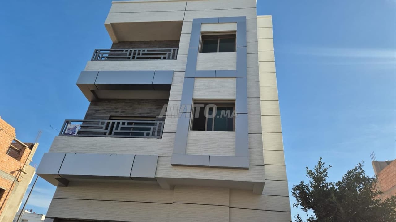 Casa compuesta de R2. Dos fachadas
