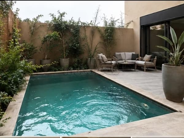 Duplex d’Exception avec Piscine Privée au Cœur de Guéliz – Marrakech