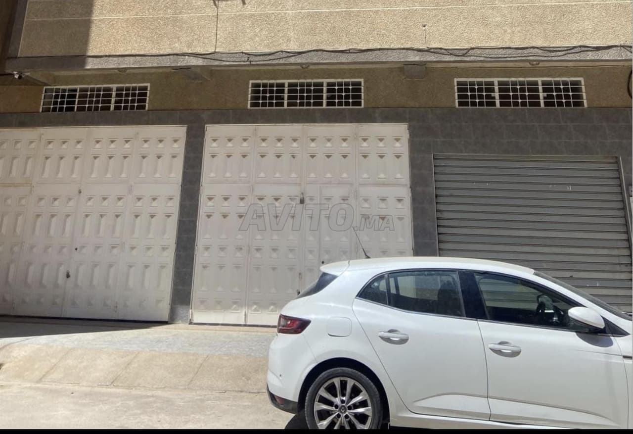 Three garages, two attached and one separate