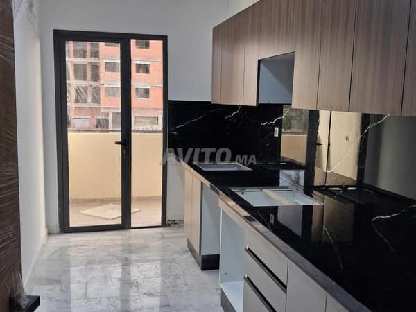 Appartement à louer 77m² à Victoria Bouskoura