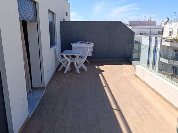 Gemeubileerd appartement met terras boven Agdal