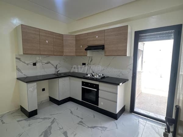 Appt 87m2 -11m2 de garage sous sol à Bouskoura