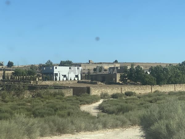 Large property with house and land for sale