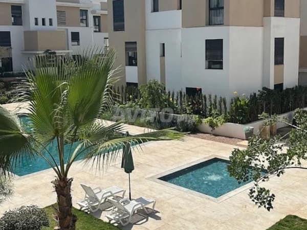 Ground Floor Apartment with Small Garden and Pool View