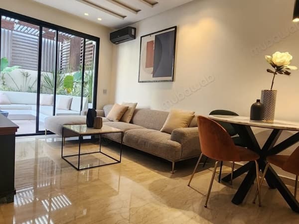 Modern appartement met terras en gedeeld zwembad te huur in Oasis