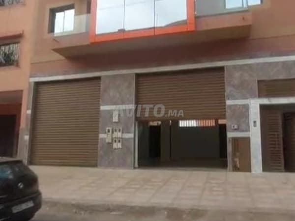 R+2 met grote winkel en 4 appartementen in Hay Almassar