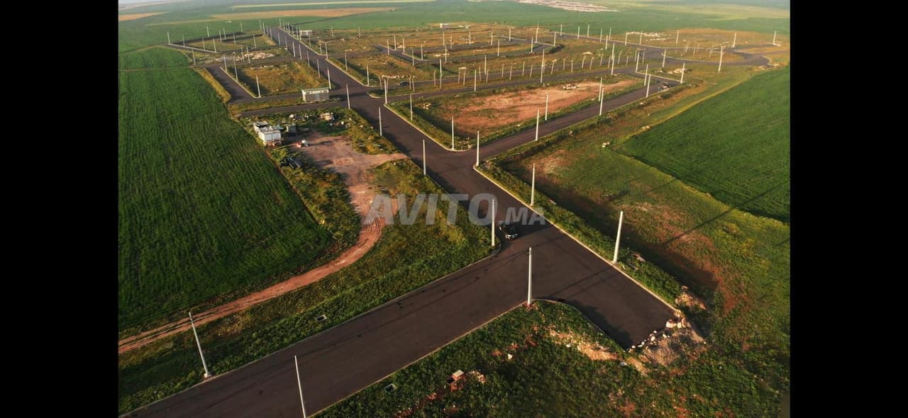 lot de terrain 120m² commerce