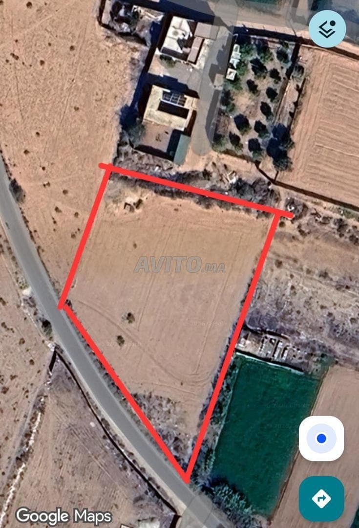 Land with well (Titré)