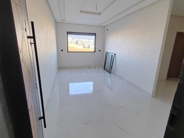 Superbe appartement à vendre près du nouveau marché de Kesbrata