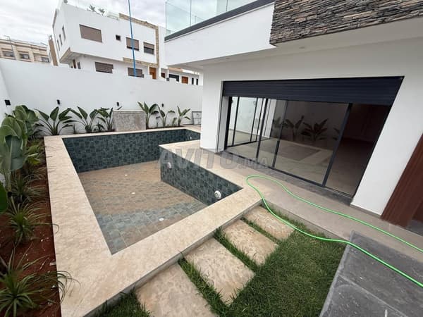 Luxury Duplex Villa with 3 Facades and Pool in Al Boustan