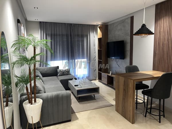 Studio meublé 50m² avec balcon, garage et ascenseur