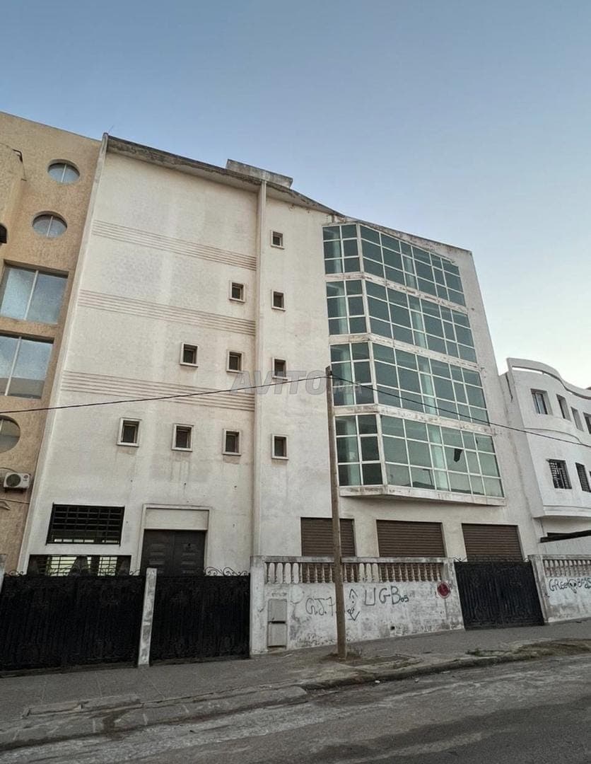 edificio 2 sótanos, planta baja y 4 plantas