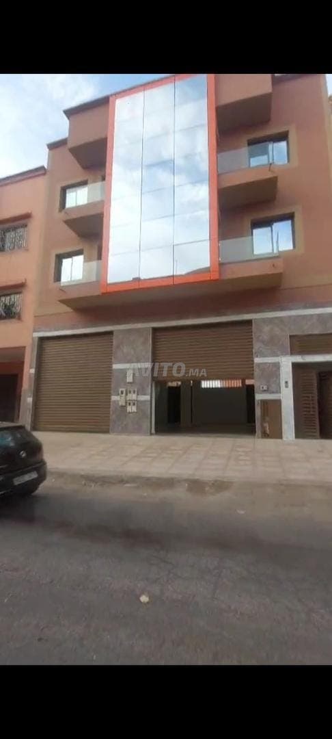 R2 avec Grand Magasin et 4 Appts à Hay Al massar