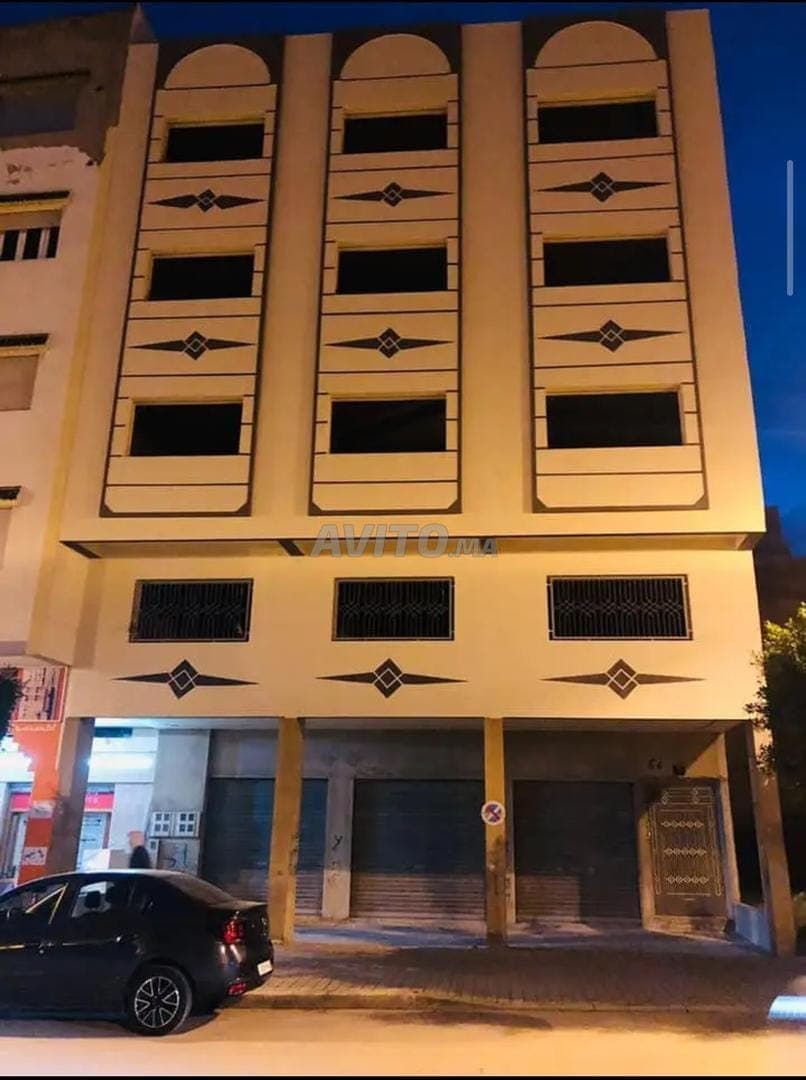 عمارة للبيع في براني 1 على شارع رئيسي كبير