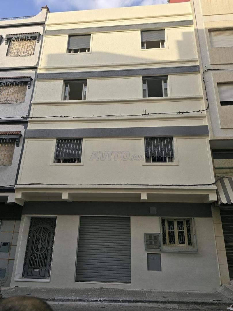 Grande maison avec 5 étages