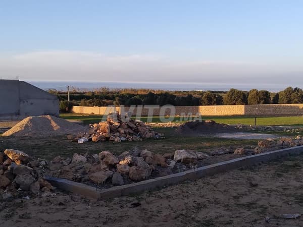 Terrain titré de 420m2 près de la mer
