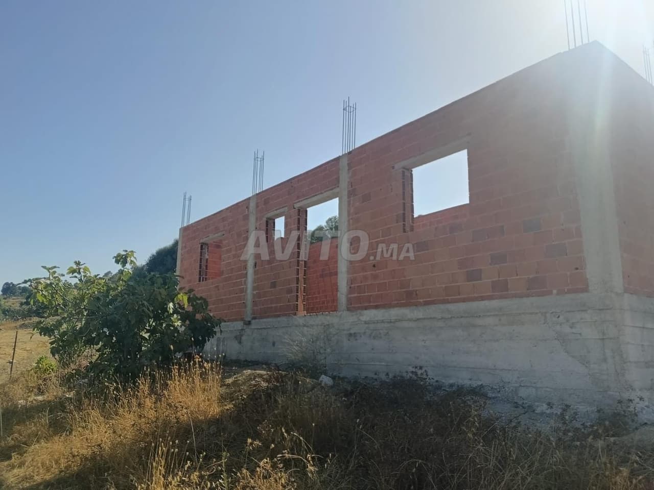 Terreno titolato di 509 m² con casa autorizzata e legale incompiuta