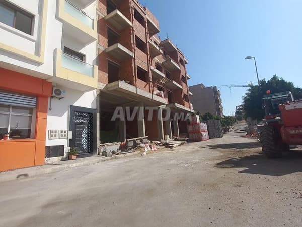 Terrain 2 façades 250 mètres garage 3 lots 3 appartements à l'étage
