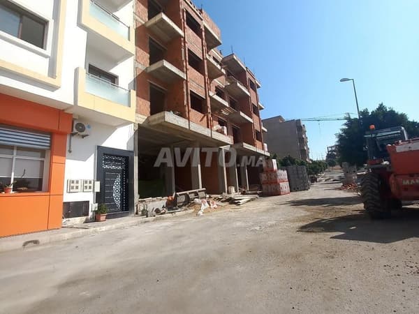 Terrain 250 m², 2 façades, garage, 3 lots, 3 appartements par étage