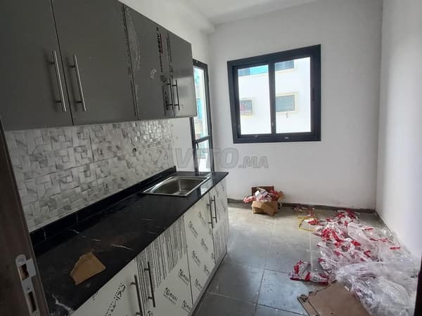 Appartement 57 m², ascenseur, balcon, vue sur rue